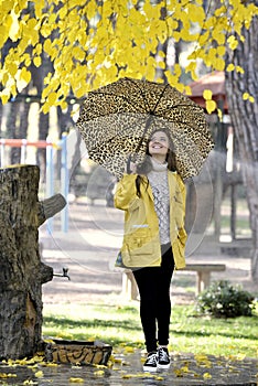 Happiness young woman with umbrella