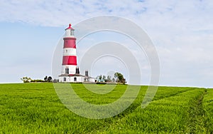 Happisburgh lighthouse on top of a hill