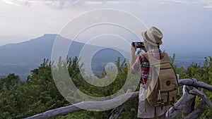 Happpy yoing girl at beautiful view point at Phu Pa Po Loei Thailand