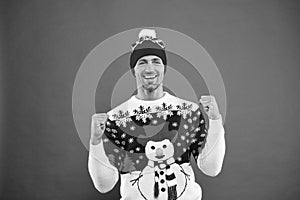 Happy 2020 year. Christmas concept. Guy in funny snowman sweater celebrate winter. Handsome man wear winter sweater