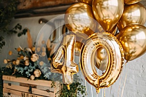 Happy 40th birthday. Gold helium 40 birthday balloons at a celebration event