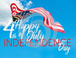 Happy 4th of July Independence day.  American flag in blue sky background