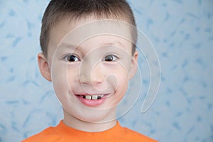Happy Adorable boy at 7 age portrait closeup, Caucasian child, second dentition concept