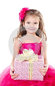 Happy adorable little girl with christmas gift box