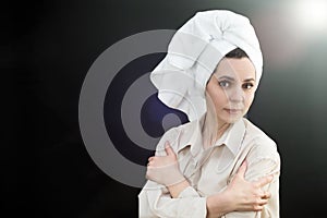 Happy adult woman with white towel her head