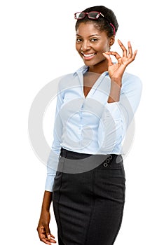 Happy African American businesswoman okay sign isolated on white photo