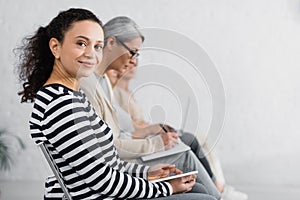 happy african american businesswoman using digital