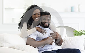 Happy African American Couple Smiling And Posing To Camera