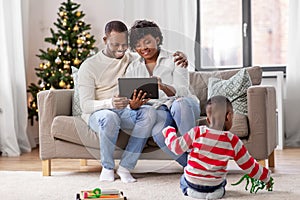 happy african american family on christmas at home