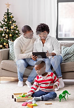 happy african american family on christmas at home