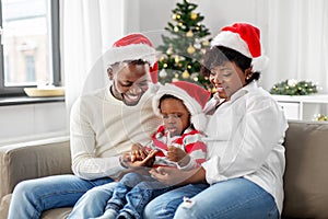 happy african american family on christmas at home