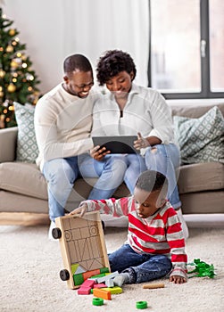 happy african american family on christmas at home