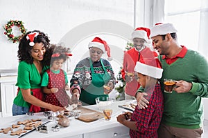 happy african american family drinking orange