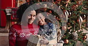 Happy african american family enjoying Christmas time together.