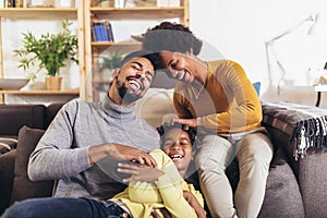 African american family having fun at home photo