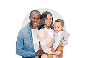 happy african american family with one child smiling at camera