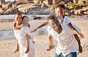 Happy african american family with two children enjoying vacation by the beach. Playful parents carrying their daughter