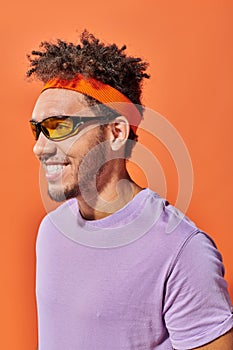 happy african american fella in eyeglasses photo
