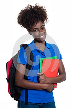 Happy african american female student with backpack