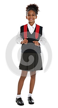 Happy African-American girl in school uniform on white