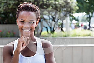 Happy african american girl with short hair