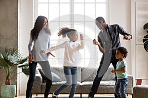 Happy African American having fun together indoors photo