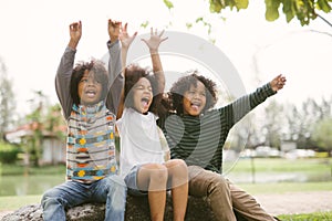 Happy African american little boy kids children joyfully cheerful and laughing. Concept of happiness.