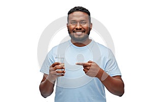 Happy african american man with glass of water