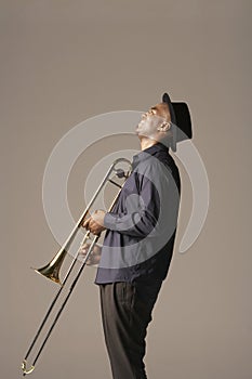 Happy African American Man With Trombone