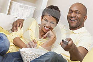 Happy African American Woman Couple Remote Control