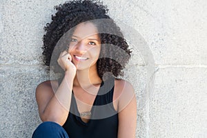 Happy african american woman with curly black hair