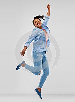 Happy african american woman dancing