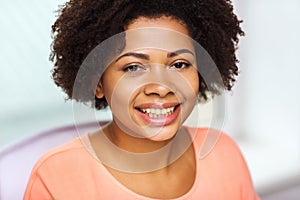 Happy african american young woman face