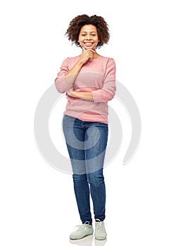 Happy african american young woman over white