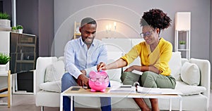 Happy African Couple Doing Retire Finances Plan