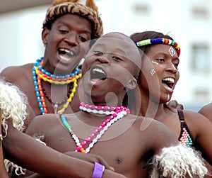 Happy African dancers singing