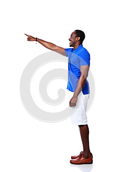 Happy african man pointing at something