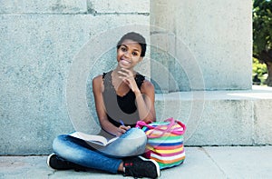 Happy african student girl