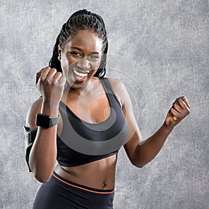 Happy african teen in sportswear.