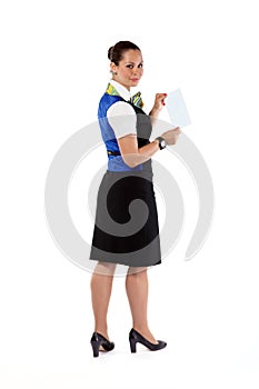 Happy air hostess holding ticket