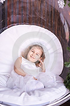 Happy amazed female kid emotion. Dreaming child studio portrait