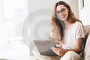 Happy amazing pretty lady using laptop computer.