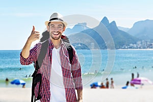 Happy american backpacker toutrist at Rio de Janeiro