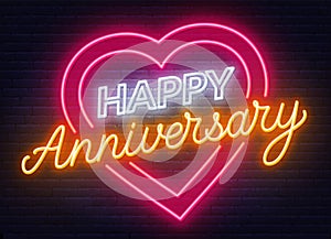 Happy anniversary neon sign. Greeting card on dark background