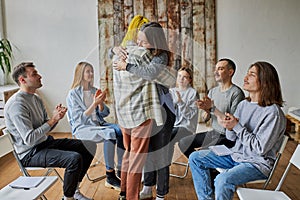 Happy anonymous alcoholics celebrate their recovery photo