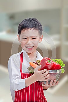 Happy Asian boy chef