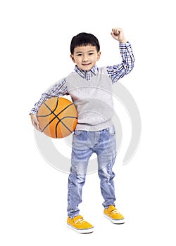 Happy asian Boy holding a basketball isolated on white background