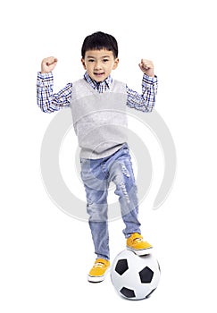 Happy asian Boy standing with football isolated on white background