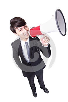 Happy asian businessman using megaphone