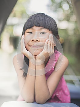 Happy Asian chidren playing at playground photo